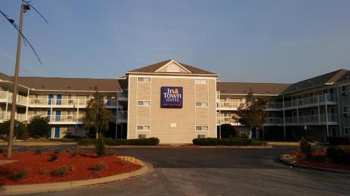 Garden City Hotel | Budget-Friendly InTown Suites with Family & Kitchen Amenities