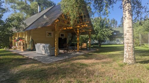 Polva County House | Experience Intsikurmu Veski Saunamaja with Pool Access