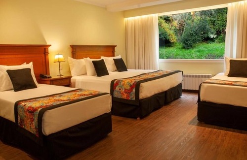 San Carlos de Bariloche Hotel | Inviting Guest Room with Spa Near Nahuel Huapi Lake and Nature Surroundings