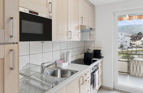 Center Apartment | Cozy 2-BR Apartment with Family-Friendly Kitchen