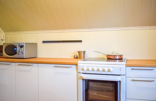 Kvam Apartment | Inviting Apartment with Boat Access on Beautiful Hardangerfjord
