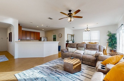 Round Rock House | Inviting home with enclosed yard and patio area with gas grill