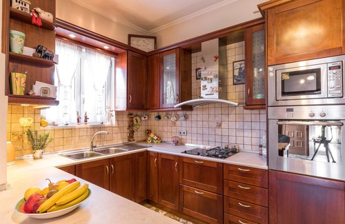 Ipsos Apartment | Relax at Ipsos Pool Apartments: Family-Friendly Retreat