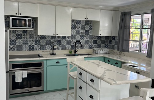 Orange Bay House | Seaside Bliss: Irie Vibes 2-Bedroom Villa with Pool