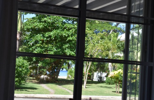 Orange Bay House | Seaside Bliss: Irie Vibes 2-Bedroom Villa with Pool