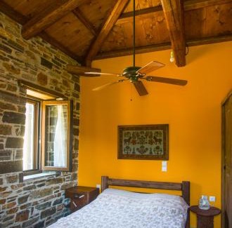 Steni Dirfyos Apartment | Discover Iris' Traditional Stone House - Pet Friendly Retreat