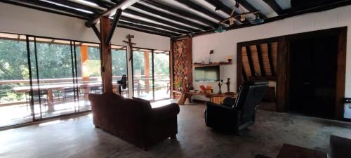Yolombo House | Top-Rated Isla Escondida Maceo Finca Hotel & Restaurant
