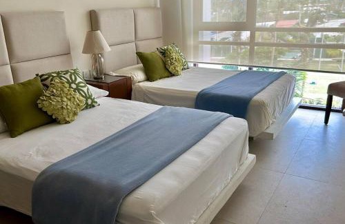 Playa Diamante Apartment | Seaside Getaway at Isla Residences - Rated 10/10 by Guests