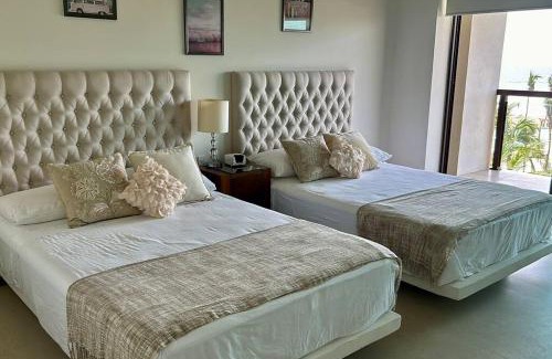 Playa Diamante Apartment | Seaside Getaway at Isla Residences - Rated 10/10 by Guests