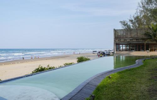 Tuxpan Hotel | Relax at Isla Tajín: Oceanfront Paradise with Spa & Pool