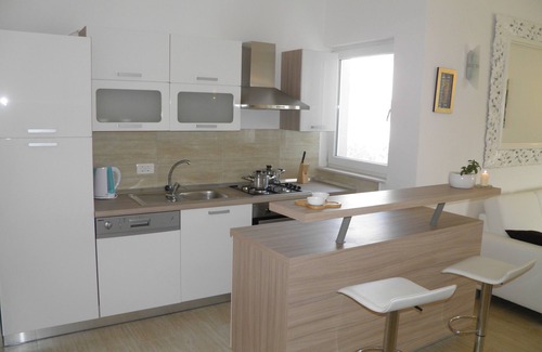 Dinjiska Apartment | Seafront Island Pag: Delightful Stay with Breakfast Included