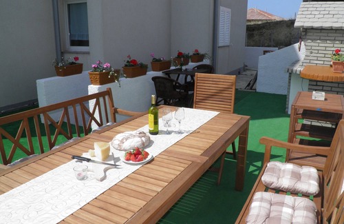 Dinjiska Apartment | Seafront Island Pag: Delightful Stay with Breakfast Included