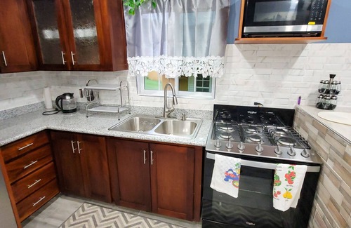 Greenwich Estate House | Island Serenity: Relaxing Spa, Hot Tub & Family Amenities