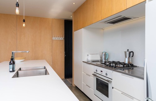 Mangawhai House | Island View: Designer Holiday Home with Spectacular Views