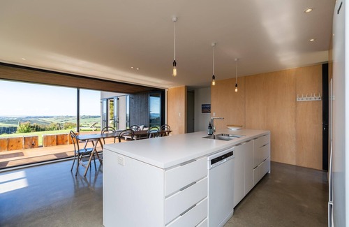 Mangawhai House | Island View: Designer Holiday Home with Spectacular Views