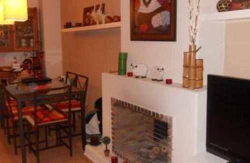 Islantilla Apartment | Relax at Islantilla Bajo con Jardin: Pet-Friendly Retreat