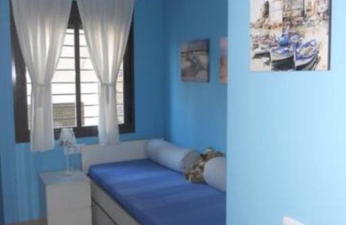 Islantilla Apartment | Relax at Islantilla Bajo con Jardin: Pet-Friendly Retreat