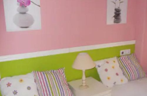Islantilla Apartment | Relax at Islantilla Bajo con Jardin: Pet-Friendly Retreat