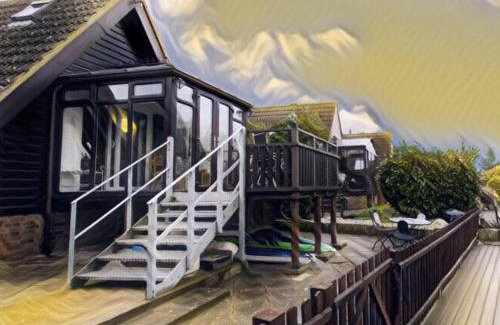 Thistley Green Cabin | Isleham River Lodge: Pet-Friendly Retreat with Breakfast Included