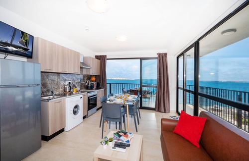 Bugibba Apartment | Seafront Apartment with Corner Terrace & Ocean Views