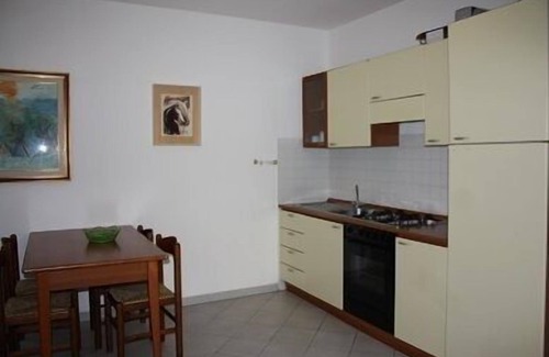 Trinita d'Agultu e Vignola Apartment | Isola Rossa Borgo Mare: Oceanfront Oasis with Spa & Pool