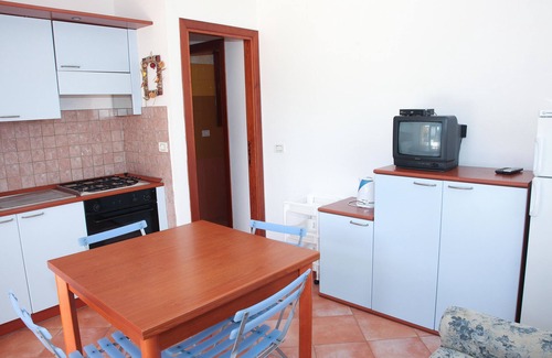Trinita d'Agultu e Vignola Apartment | Isola Rossa Borgo Mare: Oceanfront Oasis with Spa & Pool