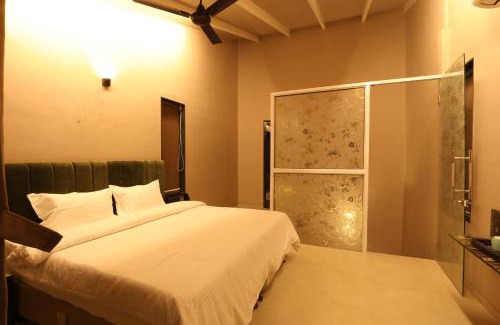 Nashik House | Relax at Isola Farm Suites with Pool & Breakfast Options