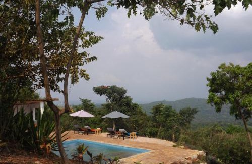 Fort Portal Cabin | Isunga Lodge: Oceanfront Retreat with Pool & 9.6/10 Rating
