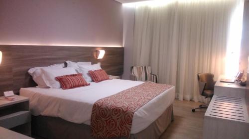 Itabira Hotel | IT Itabira Hotel: Pet-Friendly Stay with Pool & Hot Tub