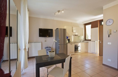 Maccagno con Pino e Veddasca Apartment | Elegant Studio Apartments with Pool and Lake View Amenities