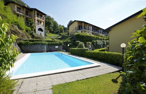 Maccagno con Pino e Veddasca Apartment | Elegant Studio Apartments with Pool and Lake View Amenities
