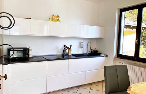 Pino Lago Maggiore Apartment | Belvilla by OYO: Inviting Holiday Home with Garden Oasis
