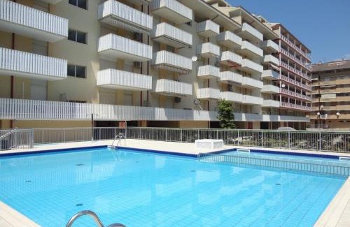 Porto Santa Margherita Apartment | Inviting Flat with Pool Access - Pet and Child Friendly