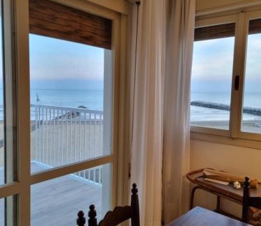 Porto Santa Margherita Apartment | Beachfront Retreat at Condomino Giuditta with Ocean Views