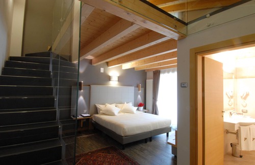 Primiero San Martino di Castrozza Hotel | Discover Hotel Garni Vittoria: 4-Star Comfort & Family-Friendly