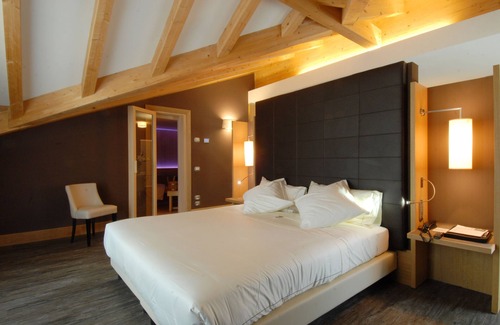 Primiero San Martino di Castrozza Hotel | Discover Hotel Garni Vittoria: 4-Star Comfort & Family-Friendly