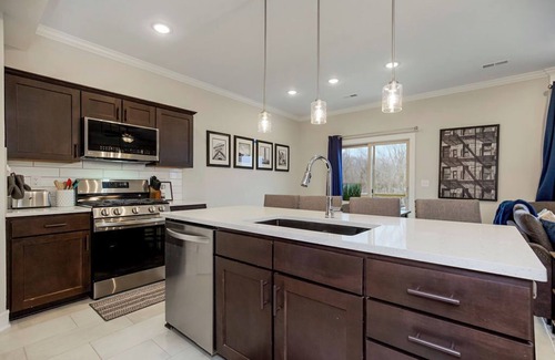 Waldron House | It's a Grand Slam! Charming 3-bedroom townhome in brilliant Parkville!