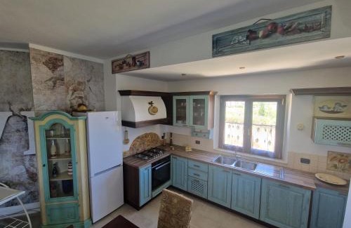 Santa Caterina Dello Ionio Marina Apartment | Beachside Retreat: Mary's House 1 with Ocean View and Family Fun