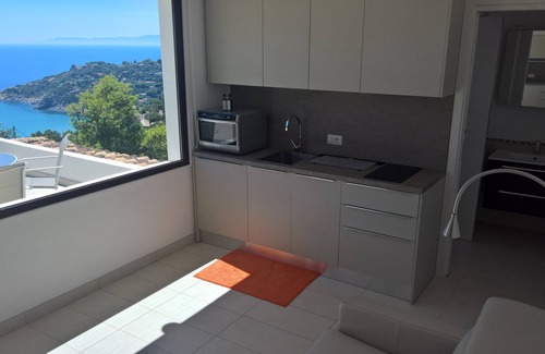 Villaggio delle Mimose Apartment | Idyllic Apartment with Pool and Ocean Views Near Villasimius