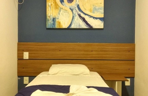 Itacuruca Hotel | Relax at Itacuruçá Inn: Poolside Family Getaway Awaits!