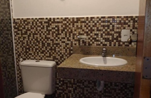 Itacuruca Hotel | Relax at Itacuruçá Inn: Poolside Family Getaway Awaits!