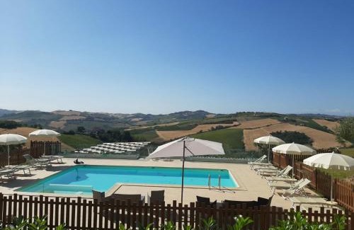 Carassai Villa | Italian Retreat: La Casa di Campagna with Family-Friendly Pool