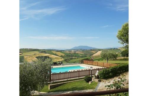 Carassai Villa | Italian Retreat: La Casa di Campagna with Family-Friendly Pool