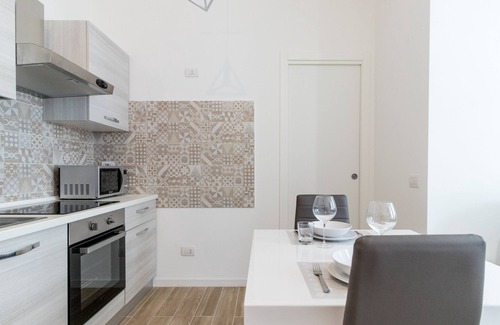Giambellino Apartment | Inviting Italianway - Savona 146: Spa & Family-Friendly Stay
