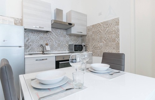 Giambellino Apartment | Inviting Italianway - Savona 146: Spa & Family-Friendly Stay