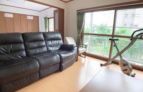 Saeki Ward Hotel | Discover Itsukaichi First Villa Hiroshima: Family-Friendly Retreat