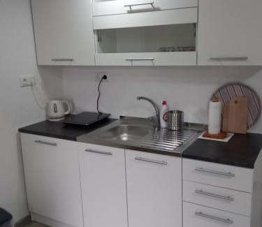 Jajce Apartment | Experience Iva Apartmani: Family-Friendly Retreat Awaits