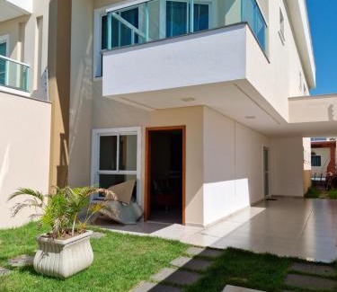 Praia do Morro House | Inviting Ivana Imoveis: Poolside Retreat Steps from Beach