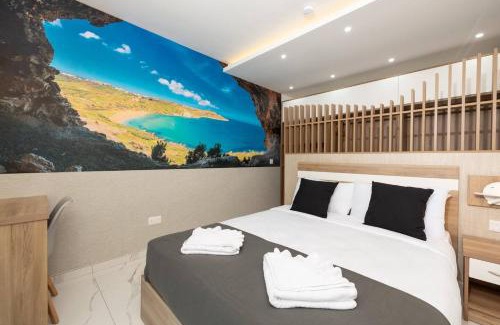 Bugibba Apartment | Seafront Ivory Suite in Bugibba with Scenic Views
