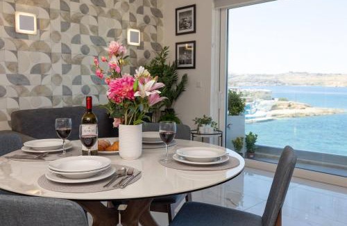 Bugibba Apartment | Seafront Ivory Suite in Bugibba with Scenic Views